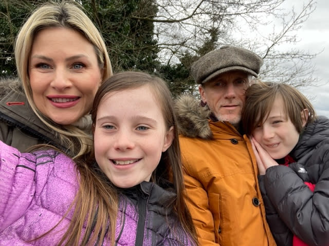 Gina Broadhurst was the picture of health until the age of 40, when she began experiencing symptoms of perimenopause.  Pictured with her husband Simon, daughter Genevieve and son Sterling.  (Delivered)