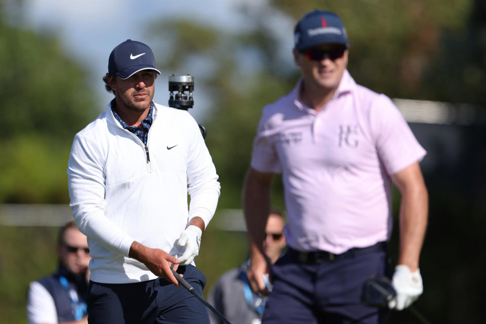 Brooks Koepka (left) is going to need to convince Zach Johnson that he's worthy of a Ryder Cup captain's choice. (Gregory Shamus/Getty Images)