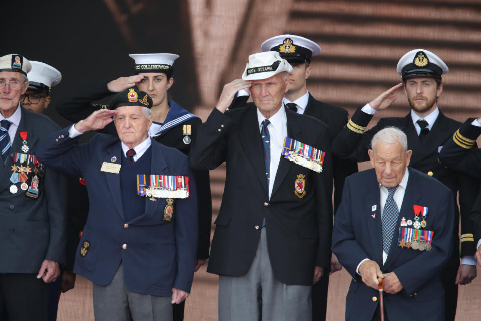 D-Day veterans take the stage during the commemorations for the 75th Anniversary of the D-Day landings at Southsea Common in Portsmouth.