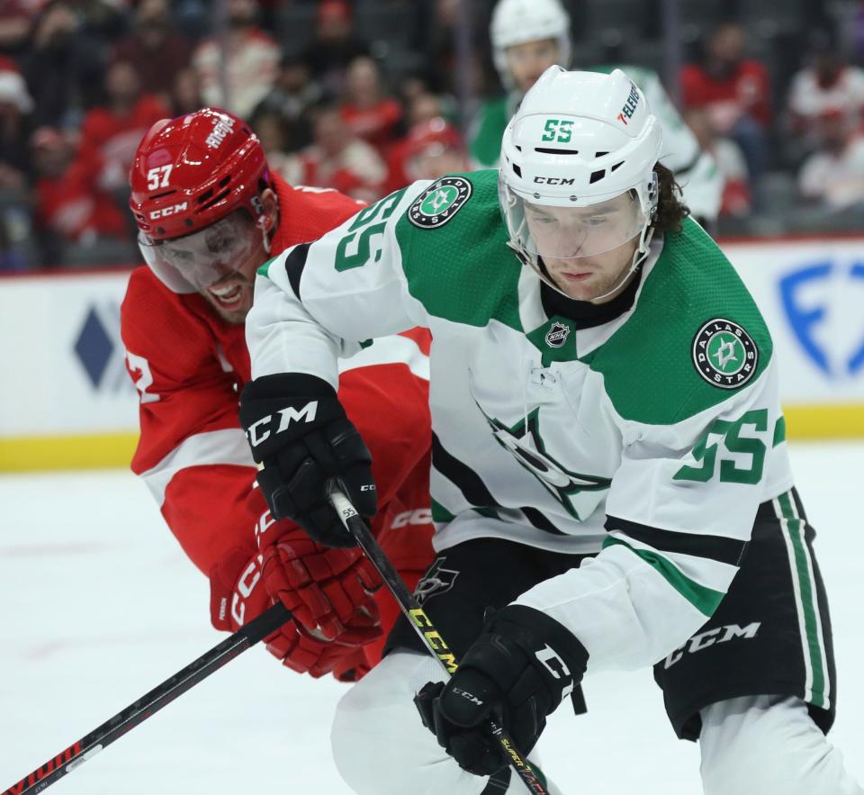 Red Wings left wing David Perron defends against Stars defenseman Thomas Harley during the first period on Monday, April 10, 2023, at Little Caesars Arena.