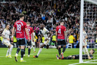 Real Madrid's Antonio Rudiger celebrates after scoring his side's second goal the Spanish La Liga soccer match between Real Madrid and Celta Vigo at the Santiago Bernabeu stadium in Madrid, Spain, Sunday, March 10, 2024. (AP Photo/Manu Fernandez)