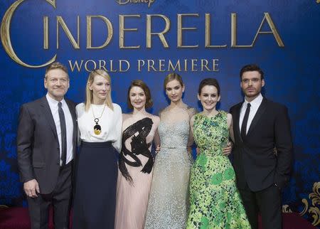 Director of the movie Kenneth Branagh poses with cast members (from 2nd L-R) Cate Blanchett, Holliday Grainger, Lily James, Sophie McShera and Richard Madden at the premiere of "Cinderella" at El Capitan theatre in Hollywood, California March 1, 2015. REUTERS/Mario Anzuoni