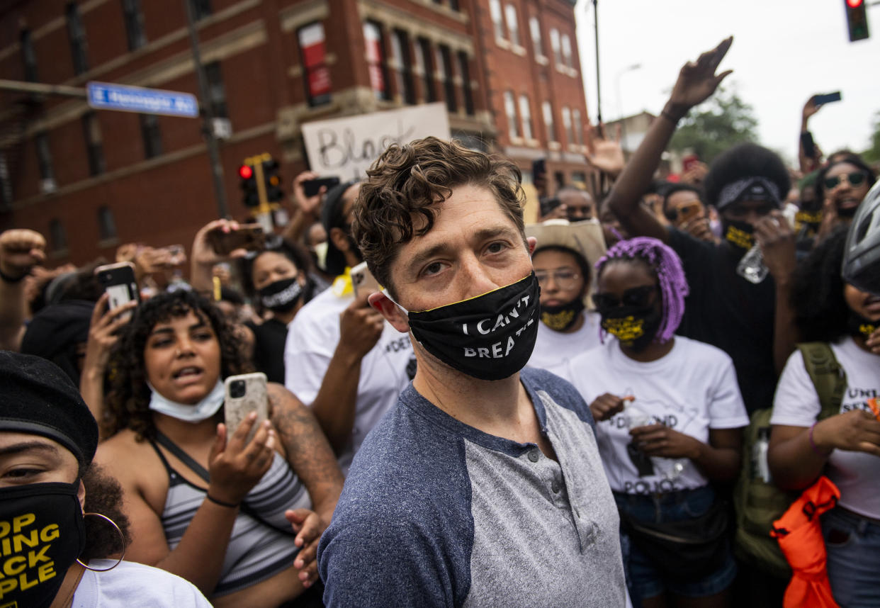 Minneapolis Mayor Jacob Frey, wearing a mask, at a demonstration on June 6, 2020, calling for the Minneapolis Police Department to be defunded  in Minneapolis, Minnesota. 