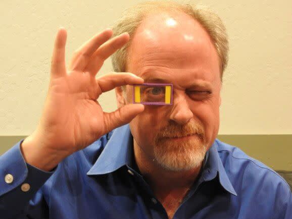 Akonia CEO Ken Anderson shows the company's holographic display.