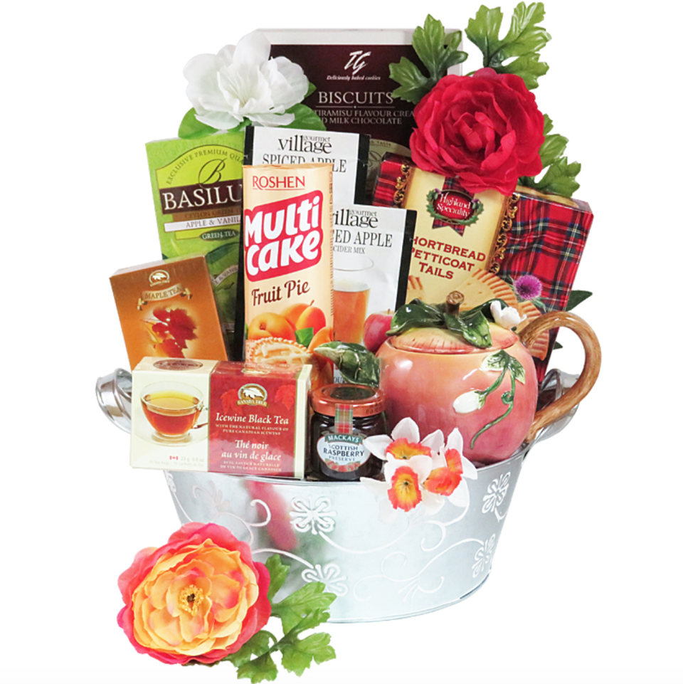 Tea Pot With Teas Basket. Image via Gourmet Gift Basket Store.