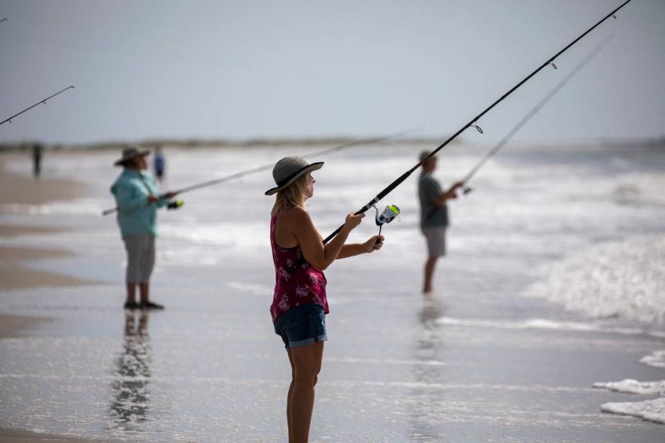 The South Carolina Department of Natural Resources with the help of volunteers put on a surf fishing clinic at Huntington Beach State Park on Thursday. July 14, 2022. JASON LEE/JASON LEE