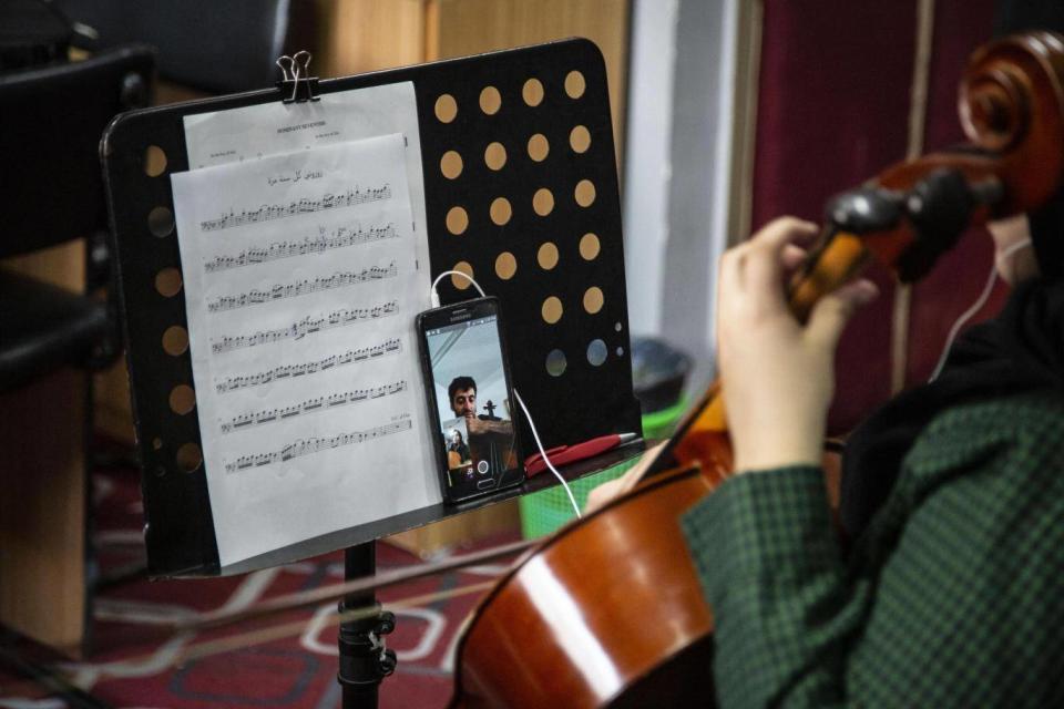 A Palestinian musical student takes lessons on Skype in Gaza (Photo: Bel Trew)