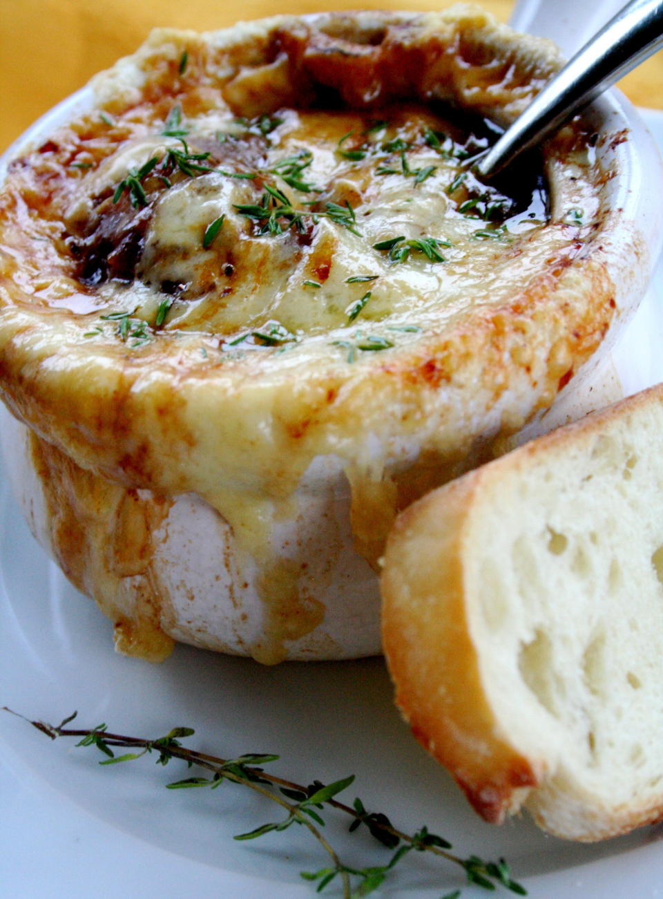 <strong>Get the <a href="http://www.thecurvycarrot.com/2010/08/07/henris-french-onion-soup/">French Onion Soup recipe from The Curvy Carrot</a></strong>  The picture really says it all, right?