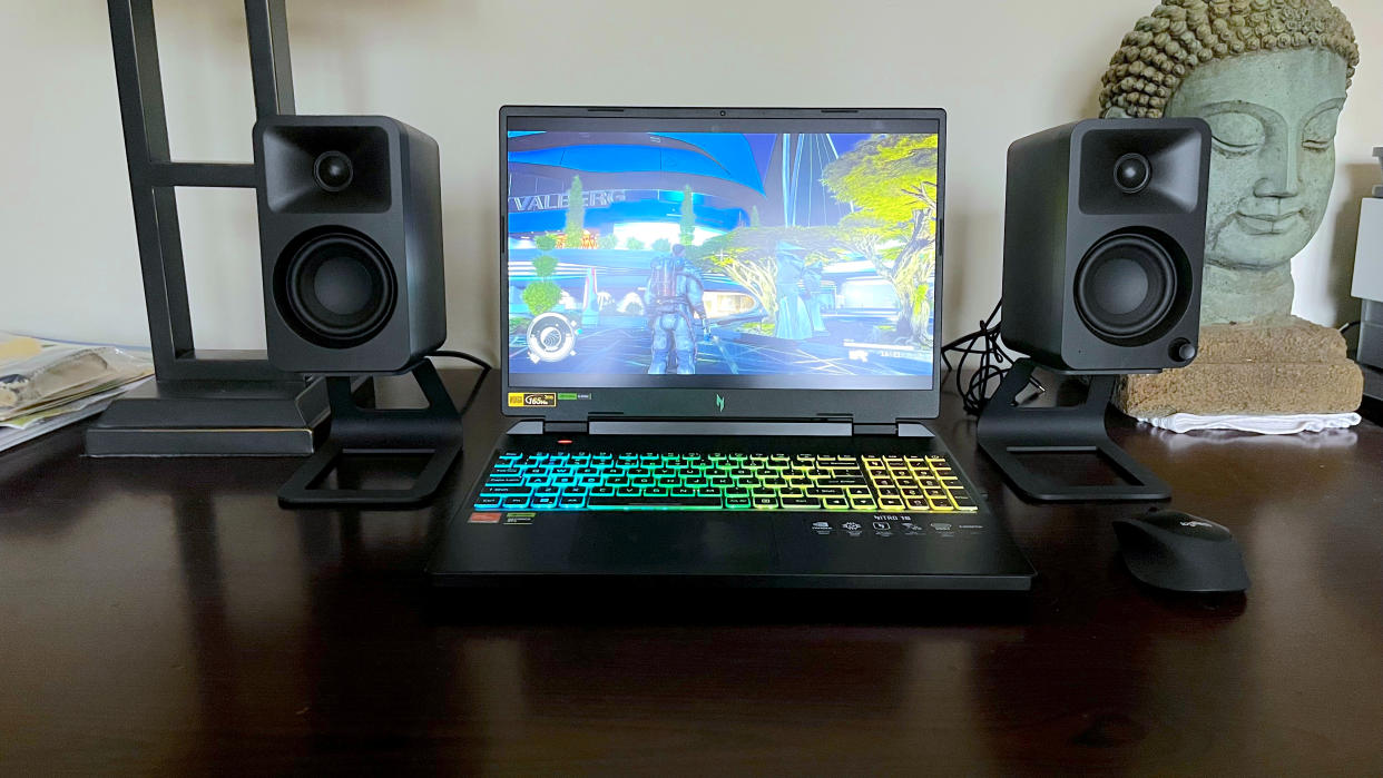  Acer Nitro 16 AMD on a desk playing a PC game. 