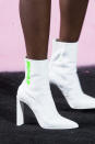 <p><i>White boots with green Puma logo from the SS18 Puma collection. (Photo: ImaxTree) </i></p>