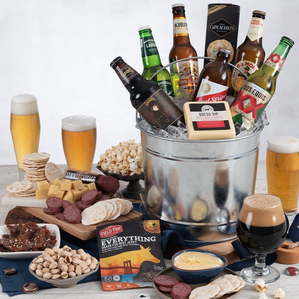 <p><a href="https://go.redirectingat.com?id=74968X1596630&url=https%3A%2F%2Fwww.gourmetgiftbaskets.com%2FSix-Beer-Bucket-Gift-Basket.asp&sref=https%3A%2F%2Fwww.countryliving.com%2Fshopping%2Fgifts%2Fg24212730%2Fbest-husband-gifts%2F" rel="nofollow noopener" target="_blank" data-ylk="slk:Shop Now;elm:context_link;itc:0;sec:content-canvas" class="link rapid-noclick-resp">Shop Now</a></p><p>Around The World Beer Bucket</p><p>gourmetgiftbaskets.com</p><p>$119.99</p><span class="copyright">Gourmet Gift Baskets</span>