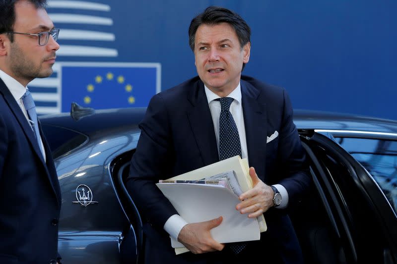 FILE PHOTO: Italian Prime Minister Guiseppe Conte arrives at a European Union leaders summit in Brussels