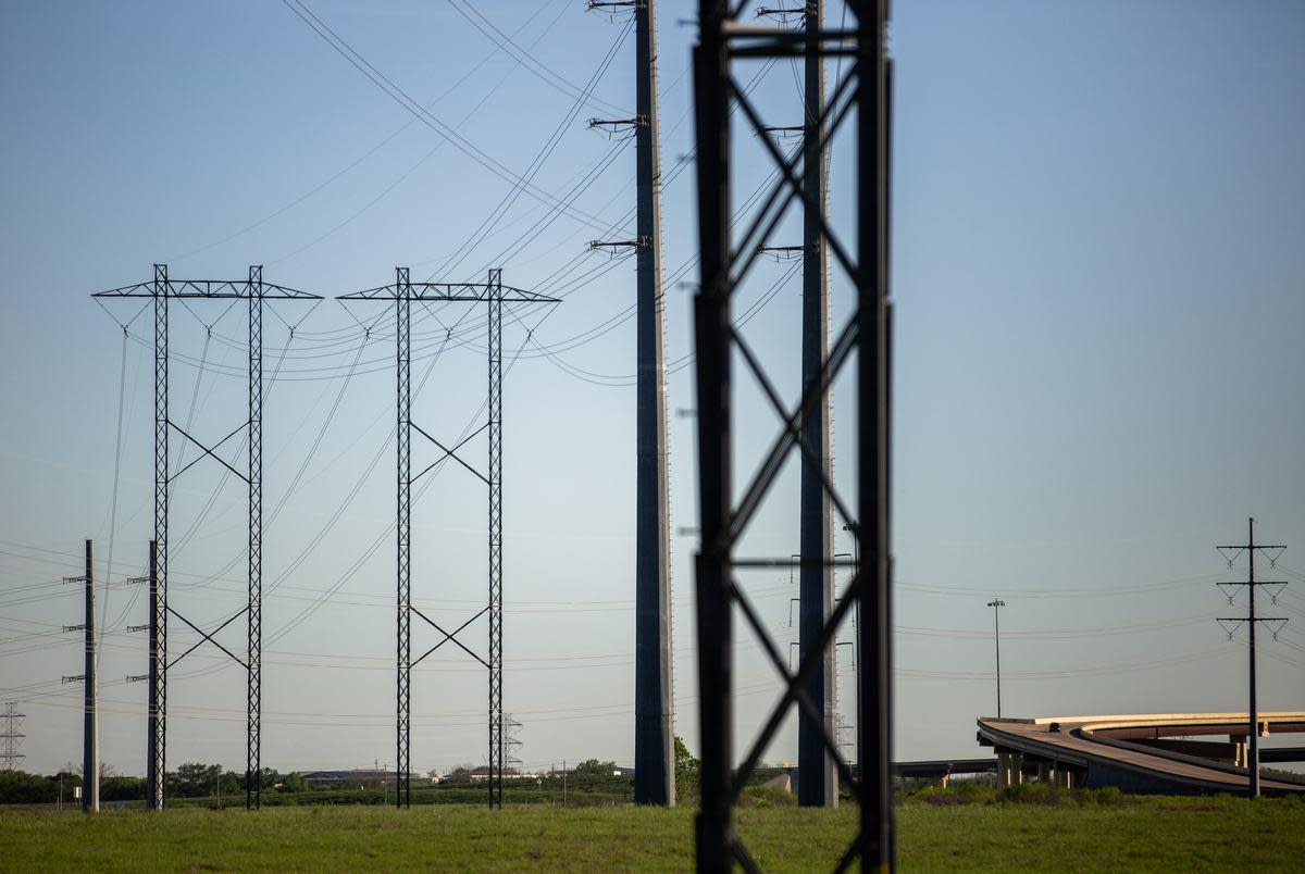 Electrical power lines near the Austin Energy/Sand Hill Energy Center in Del Valle on March 24, 2020.