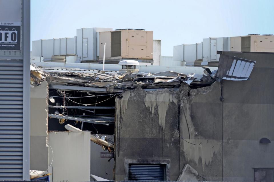 Crash site: Five people were killed when a plane hit a shopping centre in Melbourne, Australia (EPA)