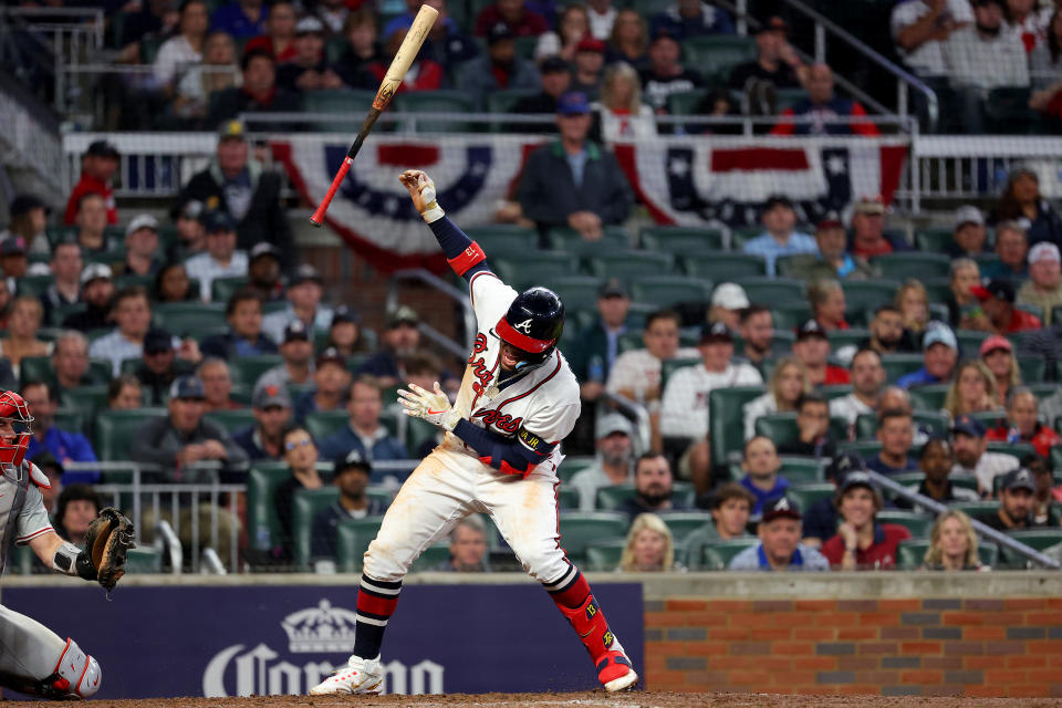 The Atlanta Braves' Ronald Acuna Jr. is hit by a pitch against the Philadelphia Phillies during Game 2 of the National League Division Series at Truist Park on Wednesday in Atlanta. (Photo by Kevin C. Cox/Getty Images)
