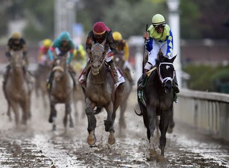 May 6, 2017; Louisville , KY, USA; John Velazquez aboard Always Dreaming (5) leads the field and wins the 2017 Kentucky Derby at Churchill Downs. Mandatory Credit: Jamie Rhodes-USA TODAY Sports