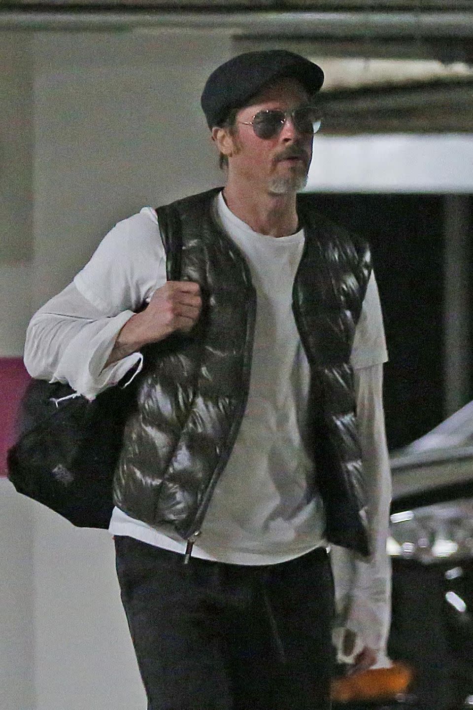 The actor looked slightly dishevelled wearing a slouching white top, gilet, black trousers, a hat and dark sunglasses as he was out and about on Tuesday. Source: Coleman-Rayner