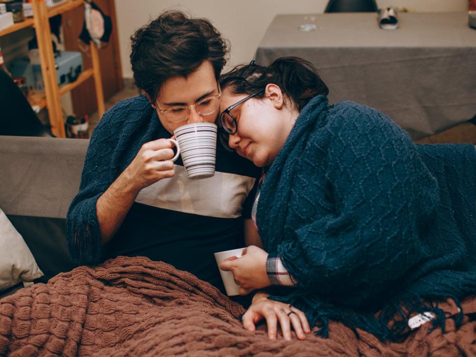 young couple sick with a cold