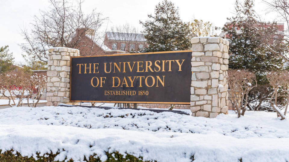 Dayton, OH, USA / February 28, 2020: University of Dayton sign, with fresh winter snow on the ground.