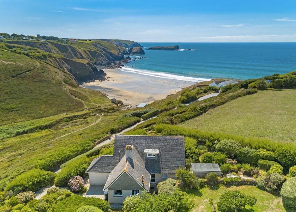 <p>The whole family will adore this stunning rental in picturesque Mullion, on the Lizard Peninsula. The pet-friendly Airbnb is a three-bedroom house overlooking Polurrian Cove Beach, one of the most beautiful beaches in Cornwall. It's secluded, offers incredible views and gives you direct access to a heavenly stretch of sand. The interiors are cosy, while the lovely garden and spacious field are perfect for walking the dog.</p><p><strong>Sleeps:</strong> 6</p><p><strong>Price per night: </strong>£250</p><p><a class="link " href="https://airbnb.pvxt.net/EKaRLP" rel="nofollow noopener" target="_blank" data-ylk="slk:SEE INSIDE;elm:context_link;itc:0;sec:content-canvas">SEE INSIDE</a></p>