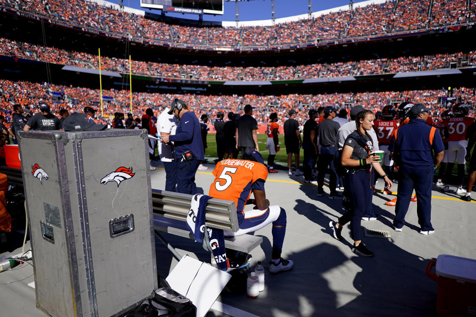 Denver Broncos quarterback Teddy Bridgewater (5) sits on the bench during the first half of an NFL football game against the Baltimore Ravens, Sunday, Oct. 3, 2021, in Denver. Bridgewater left the game with a concussion. (AP Photo/Jack Dempsey)