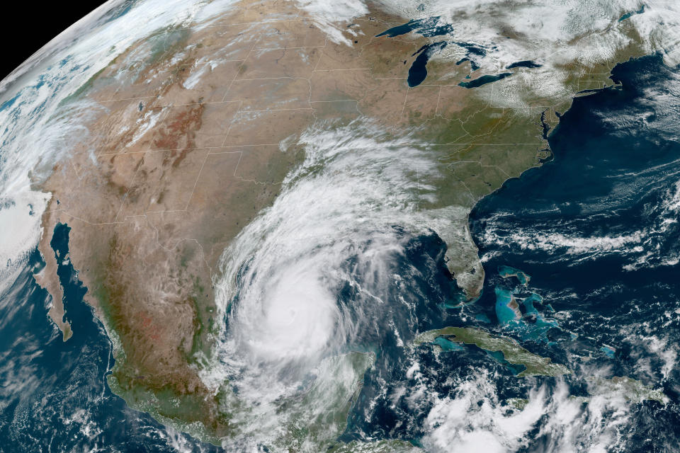 This Oct. 8, 2020 photo made available by the National Oceanic and Atmospheric Administration shows Hurricane Delta in the Gulf of Mexico at 12:41 p.m. EDT. Delta, gaining strength as it bears down on the U.S. Gulf Coast, is the latest and nastiest in a recent flurry of rapidly intensifying Atlantic hurricanes that scientists largely blame on global warming. (NOAA via AP)