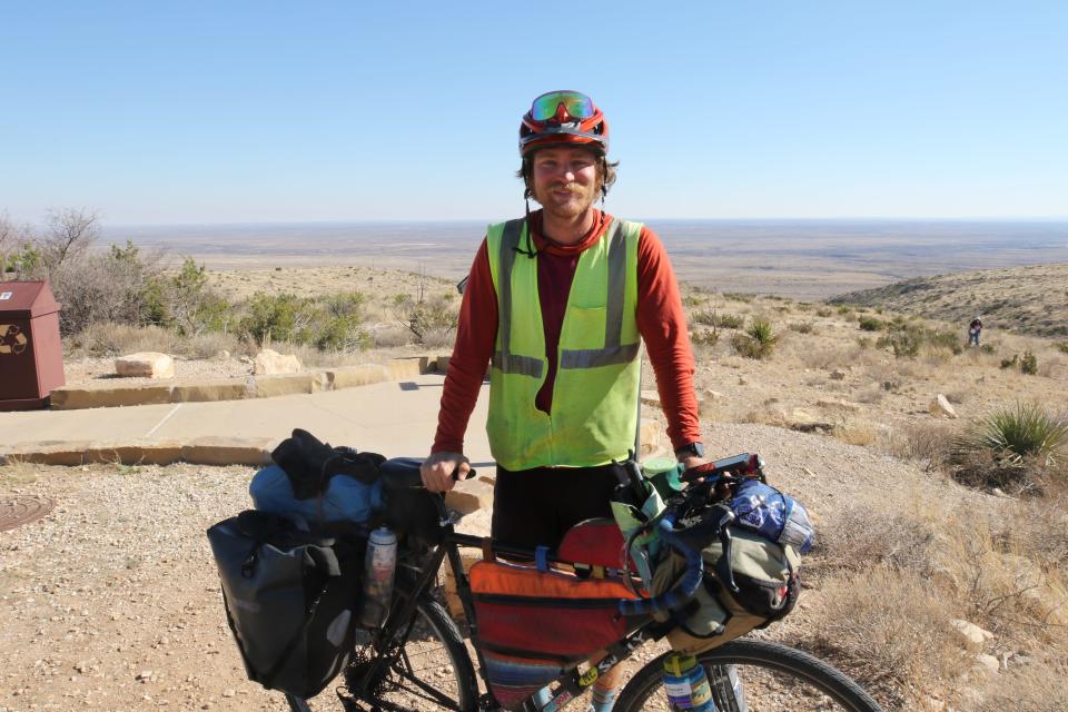 Spencer McCullough visits Carlsbad Caverns during his 18,000-mile bike trip to every national park in the U.S., March 9, 2024 at the Carlsbad Caverns National Park Visitors Center.