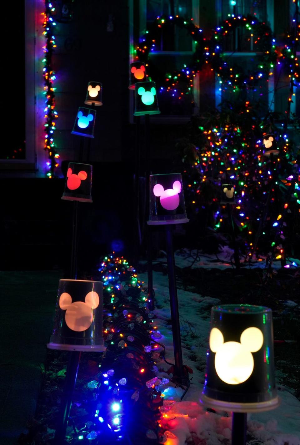 The Giroux family of East Providence created their Mickey Mouse lanterns with plastic soup containers and a Cricket cutting machine.