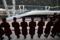 The high speed train of the new 2,298-kilometre (1,425-mile) line between Beijing and Guangzhou waits to start its journey in Beijing on December 26, 2012. China started service on December 26 on the world's longest high-speed rail route, the latest milestone in the country's rapid and -- sometimes troubled -- super fast rail network. The opening of this new line means passengers will be whisked from the capital to the southern commercial hub in just eight hours, compared with the 22 hours previously required. CHINA OUT AFP PHOTO