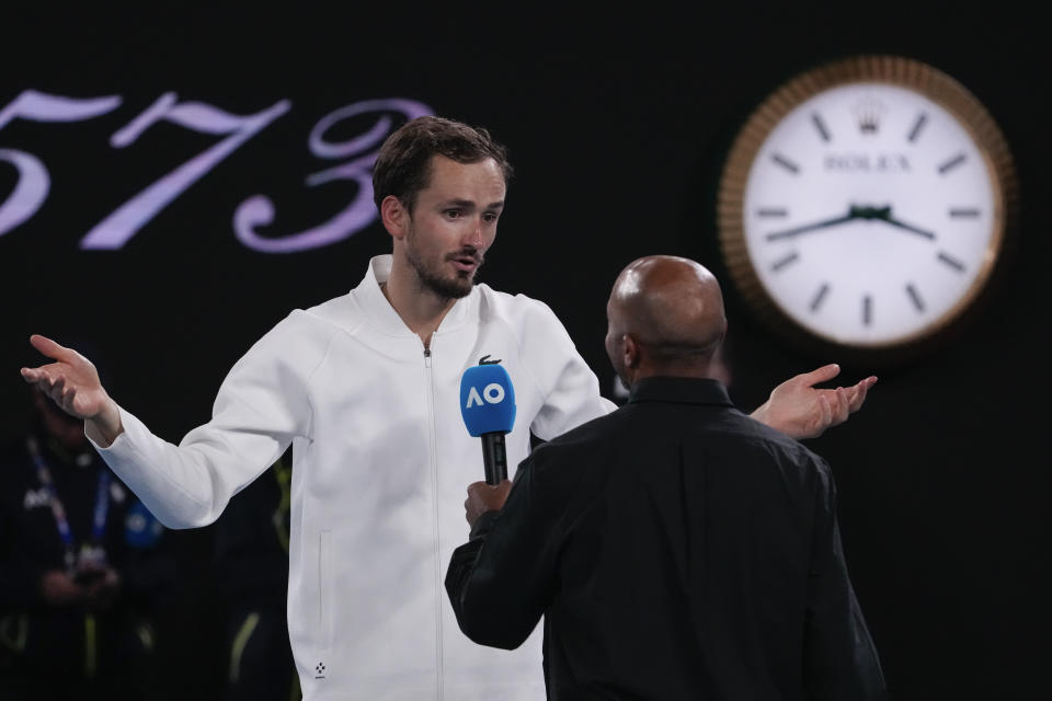 Daniil Medvedev of Russia gestures as he is interviewed after defeating Emil Ruusuvuori of Finland in their second round match at the Australian Open tennis championships at Melbourne Park, Melbourne, Australia, Friday, Jan. 19, 2024. (AP Photo/Andy Wong)