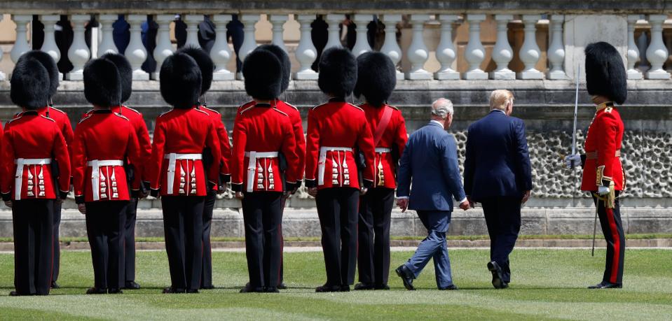 US President Donald Trump (2R) and Britain's Prince Charles, Prince of Wales (3R) inspects the guard of honour during a welcome ceremony at Buckingham Palace in central London on June 3, 2019, on the first day of the US president and First Lady's three-day State Visit to the UK. - Britain rolled out the red carpet for US President Donald Trump on June 3 as he arrived in Britain for a state visit already overshadowed by his outspoken remarks on Brexit. (Photo by Adrian DENNIS / AFP)        (Photo credit should read ADRIAN DENNIS/AFP/Getty Images)