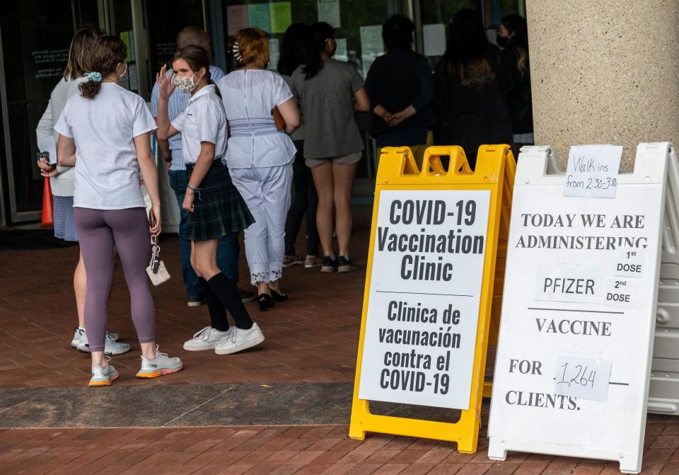 People arrive to receive Covid-19 vaccinations 