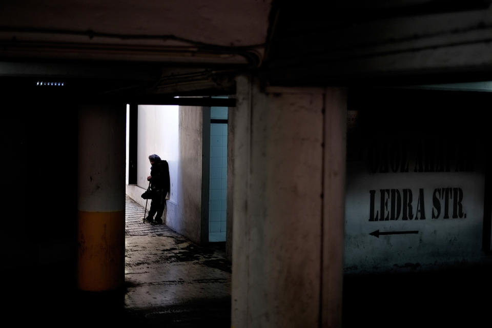 <p>An elderly woman stands at in a car park near the Ledras street checkpoint by the UN controlled buffer zone in Nicosia, Cyprus, Feb. 22, 2017. (Photo: Petros Karadjias/AP) </p>