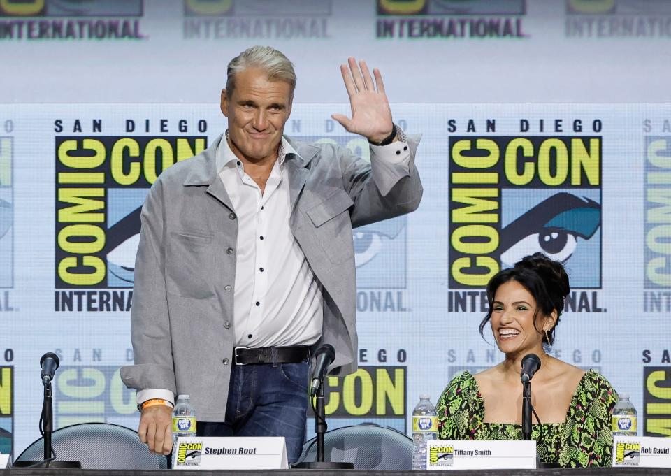 Dolph Lundgren and Tiffany Smith attend the "Masters of the Universe: 40 Years" panel during 2022 Comic-Con.