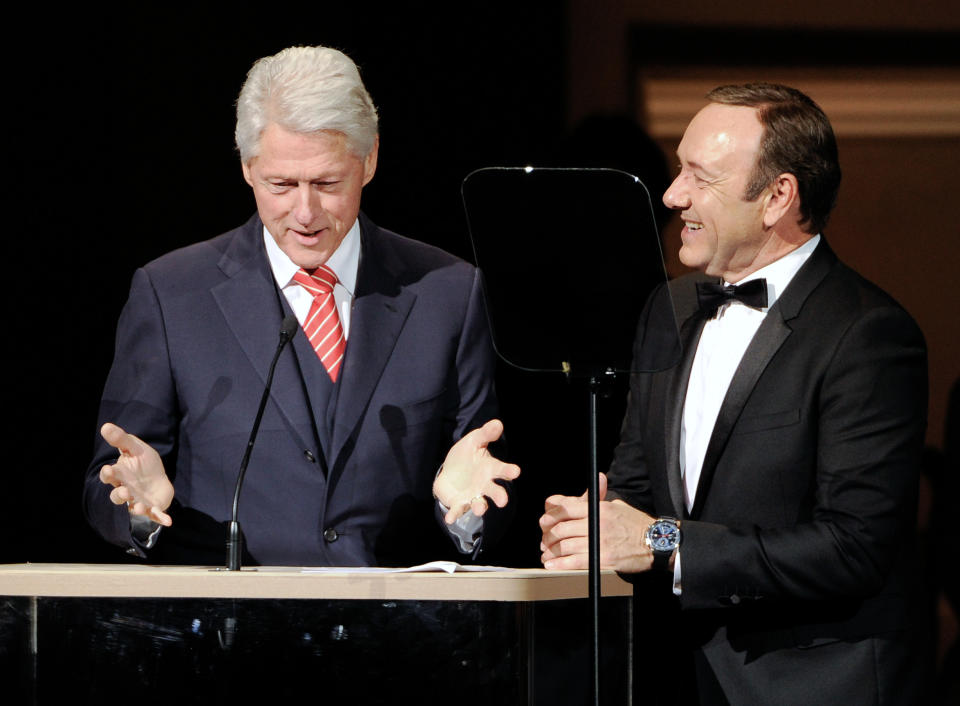 Former President Bill Clinton and actor Kevin Spacey on stage together at the 25th Anniversary Rainforest Fund benefit concert at Carnegie Hall on Thursday, April 17, 2014 in New York. (Photo by Evan Agostini/Invision/AP)