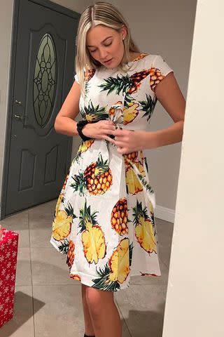 <p>Courtesy of Alexis Roberts</p> Alexis Roberts in "ugly" pineapple dress.