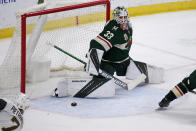 Vegas Golden Knights defenseman Alex Pietrangelo (7) scores in overtime against Minnesota Wild goaltender Cam Talbot (33) during an NHL hockey game Wednesday, May 5, 2021, in St. Paul, Minn. The Golden Knights won 3-2. (AP Photo/Andy Clayton-King)