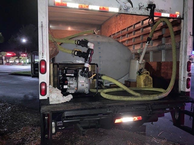 A large tank and a pump inside a truck which was used to take used cooking oil from behind Woody's, according to the Flagler County Sheriff's Office.