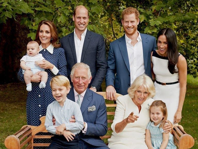 The royals on Charles' 70th birthday, including William and Kate, Harry and Meghan, Camilla, and George, Charlotte, and Louis.