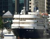 The 4,200-ton Caledonian Sky -- seen here moored at the London Docklands in 2012 -- had to be refloated by a tug boat before continuing with its cruise near Raja Ampat, in eastern Indonesia