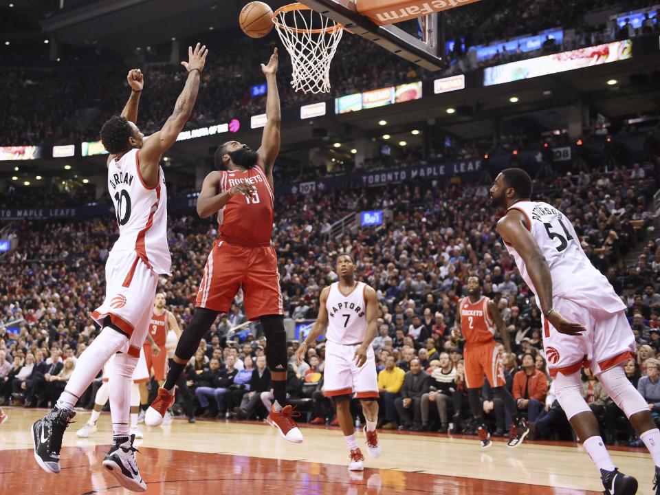 James Harden (center) has earned DeMar DeRozan’s (left) vote for MVP. (Frank Gunn/The Canadian Press via AP)