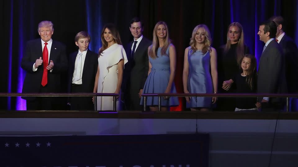 President-elect Donald Trump, left, followed by his family arrives at his election night rally. Photo: AAP