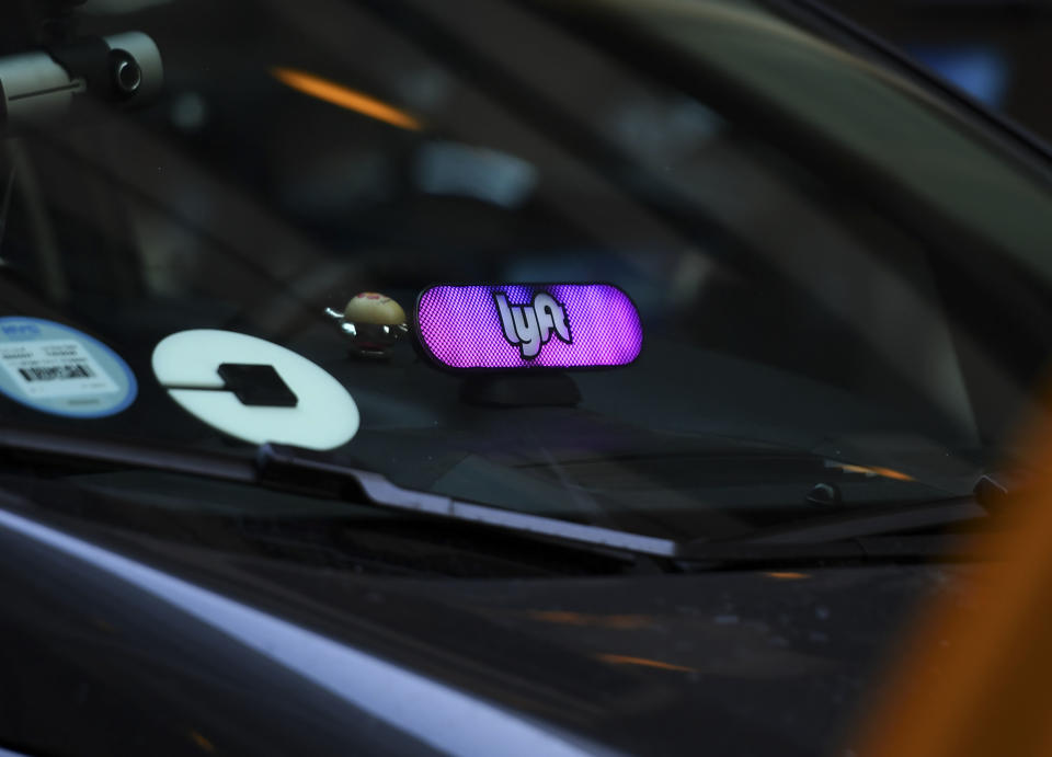 A Lyft ride-sharing car is seen on Park Avenue in New York City March 26, 2019. - Lyft Inc.'s initial public offering is expected to have its (IPO) this week making it the first of the ride-hailing companies to open up to the public. (Photo by TIMOTHY A. CLARY / AFP)        (Photo credit should read TIMOTHY A. CLARY/AFP/Getty Images)