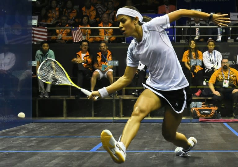 Malaysia's Nicol David competes against her compatriot Wee Wern Low in the women's squash final match at Yeomurul squash courts during the 2014 Asian Games in Incheon