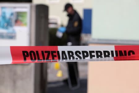 Police inspect the front of a mosque in Dresden, Germany on September 27, 2016, one day after an improvised bomb destroyed the entrance. REUTERS/Matthias Schumann