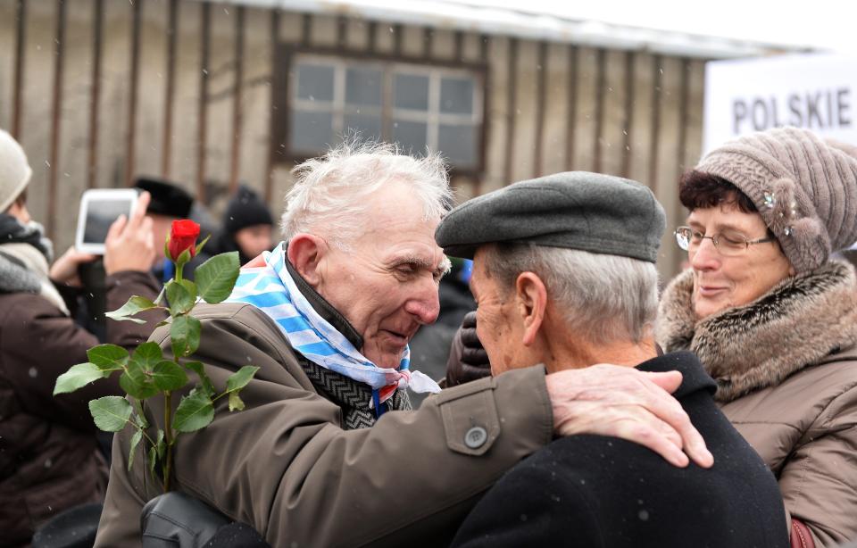 Holocaust survivors greet each others as they arrive to pay tribute to fallen comrades in the former Auschwitz concentration camp in Oswiecim, Poland, on the 70th anniversary of the liberation of the Nazi death camp on January 27, 2015. Seventy years after the liberation of Auschwitz, ageing survivors and dignitaries gather at the site synonymous with the Holocaust to honour victims and sound the alarm over a fresh wave of anti-Semitism. 