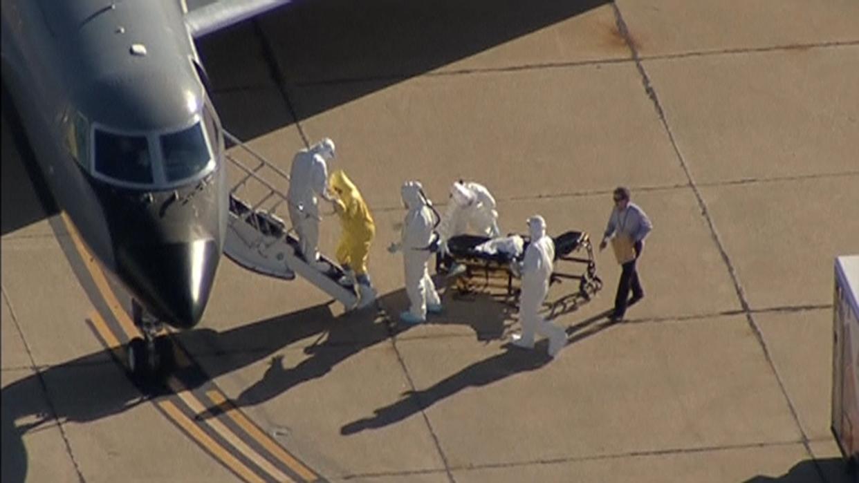 Amber Vinson is helped on to an air ambulance in Dallas last week. (Reuters/KXAS-TV) 