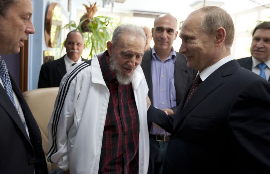 Castro meets Russia's President Vladimir Putin in July 2014 (AP Photo/Alex Castro, File)