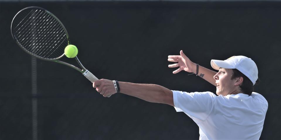 Abilene Wylie's Trevor Short reaches for a shot in his mixed doubles match with College Station's Maya Diyasheva and Paxton O'Shea. The College Station team won the Class 5A championship match 4-6, 6-3, 6-4 on Wednesday at Northside Tennis Center in Helotes.