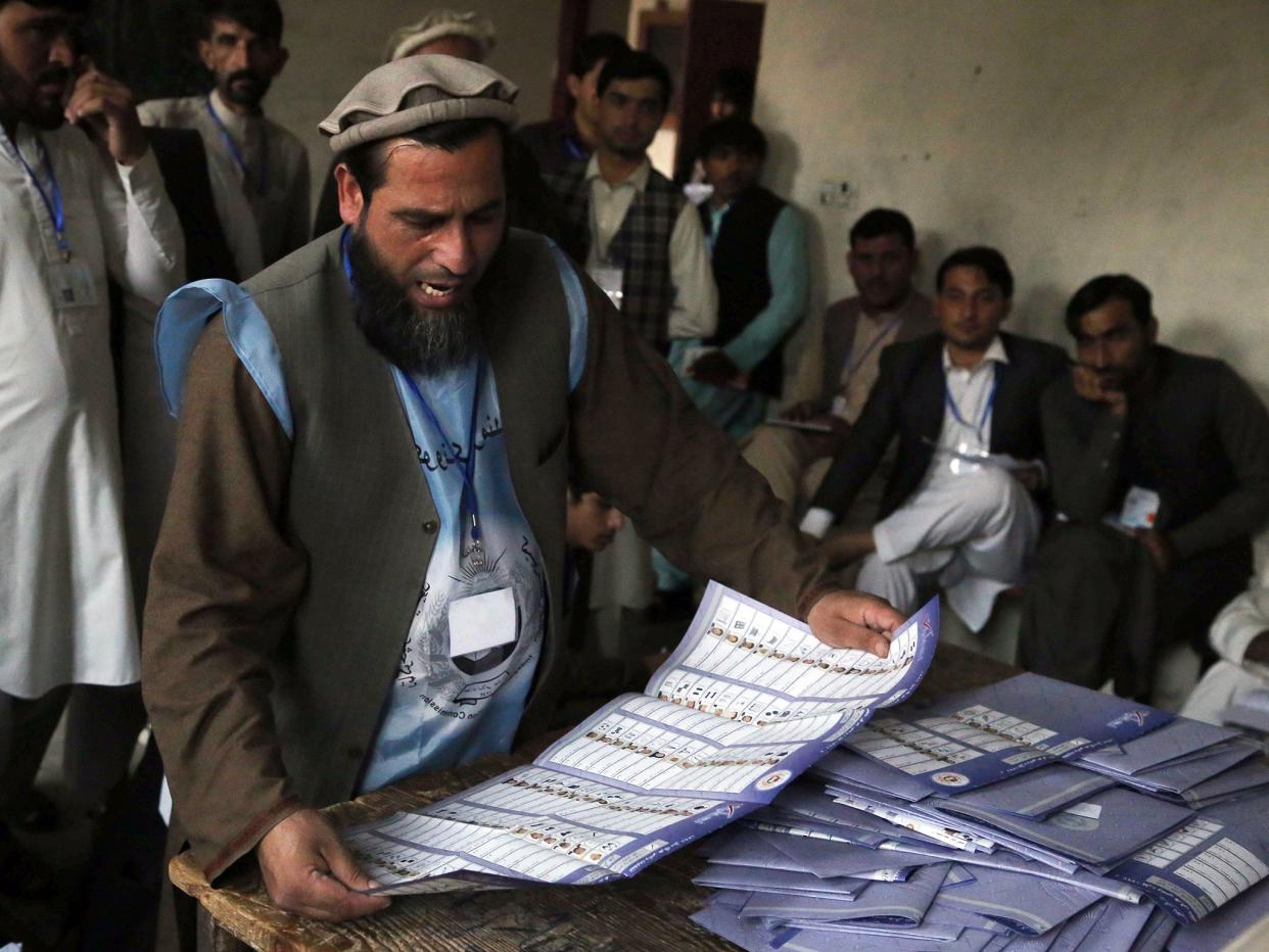 The elections have been plagued with threats of violence by Taliban militants warning people not to take part in the 'foreign-imposed' process: EPA